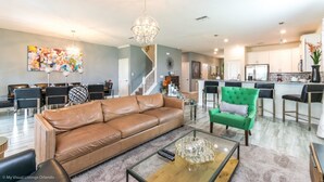 Villa, Multiple Beds | Living area | TV, foosball - Champions Gate 1314bw (Davenport)