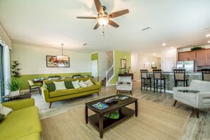 Villa, Multiple Beds | Living area | TV, table football