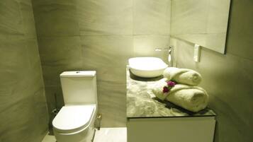 Shower, hydromassage showerhead, towels, soap