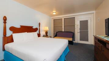 Room, Pool View (1 King or 2 Doubles) | 1 bedroom, in-room safe, desk, laptop workspace