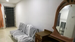 A bedroom with a bed, a dresser, a mirror, and a window with blinds. - 223 Taman Malaysia (Alor Setar)