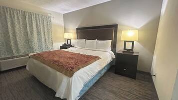 Room, 1 King Bed, Non Smoking | Desk, iron/ironing board, free WiFi, bed sheets