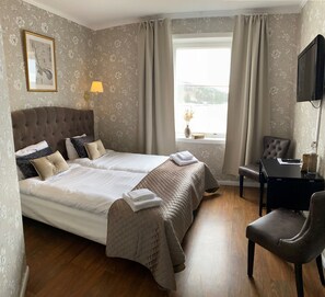 Standard Twin Room | Blackout curtains, iron/ironing board, free cots/infant beds - Björkudden Hotell & Restaurang (Sandoverken)