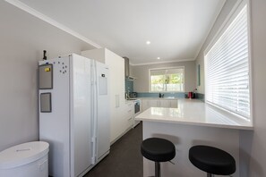 House, 4 Bedrooms | Private kitchen | Full-size fridge, microwave, oven, stovetop