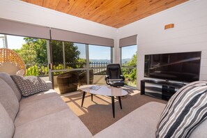 3 Bedroom House with Tri-Bunk Bed | Living area | Smart TV, Netflix, streaming services - Kawaha Point Gem (Rotorua)