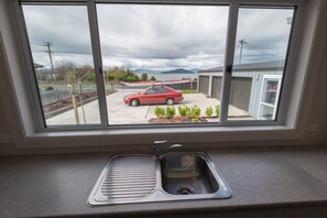 House, 4 Bedrooms | Private kitchen | Full-size fridge, microwave, oven, stovetop