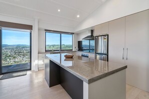 House, 3 Bedrooms | Private kitchen | Full-size fridge, microwave, oven, stovetop - The Lookout Retreat (Rotorua)