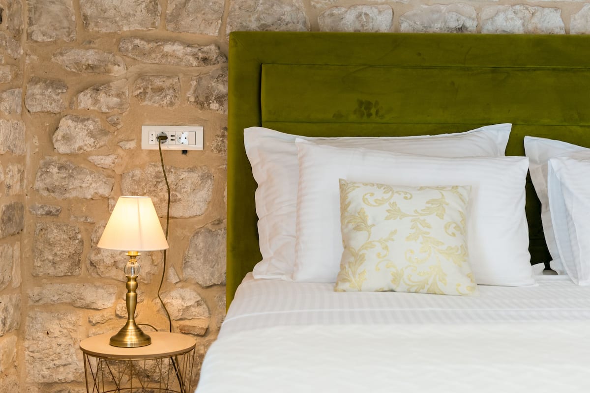 Frette Italian sheets, premium bedding, memory-foam beds, desk