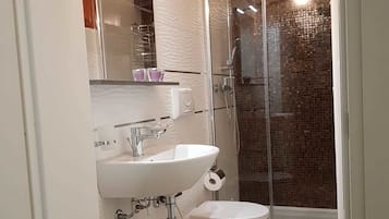 Studio, 1 Queen Bed (Left side) | Bathroom | Shower, rainfall showerhead, free toiletries, hair dryer