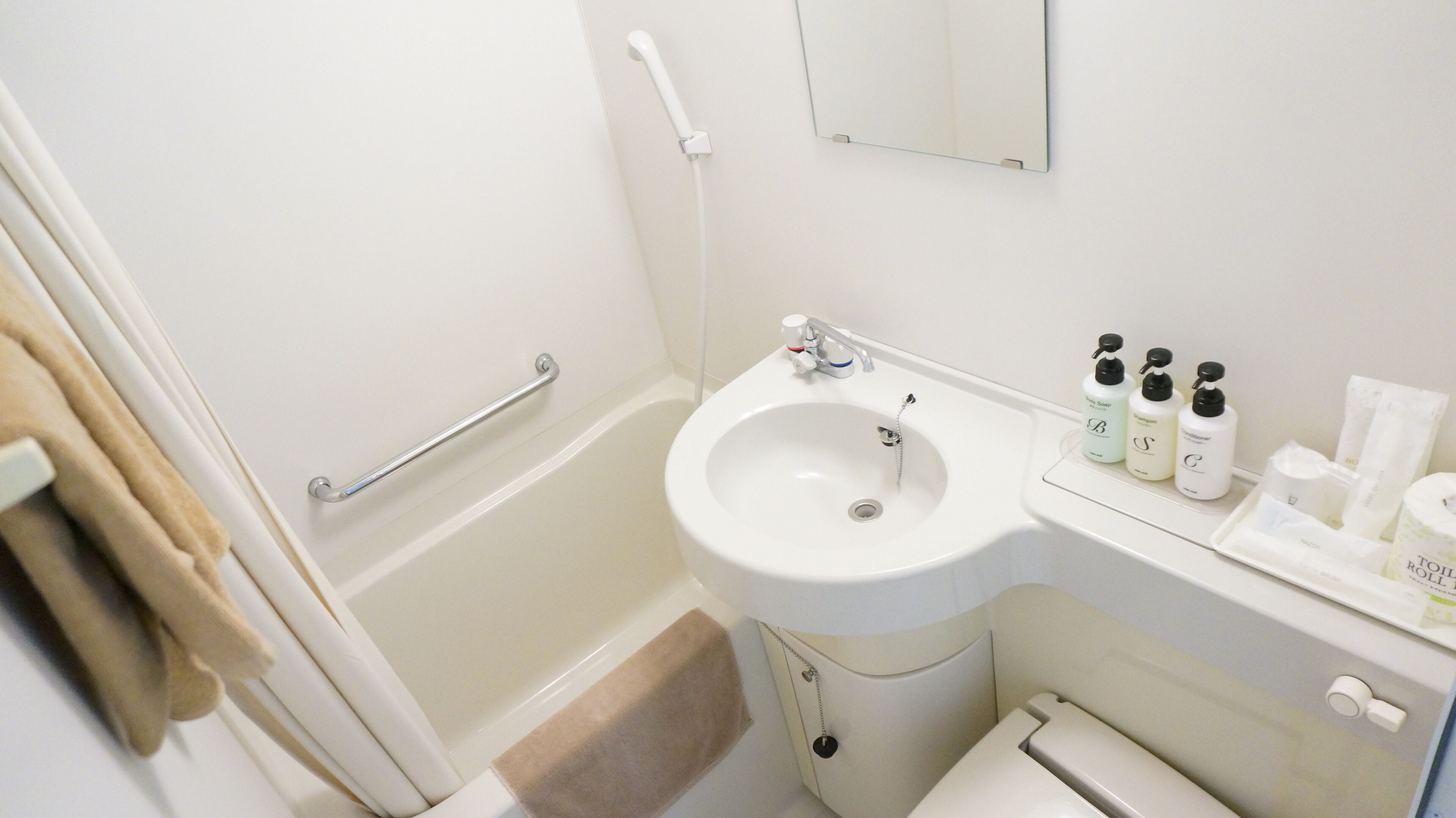 combined shower/bathtub, free toiletries, hair dryer, bathrobes