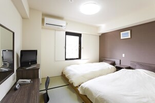 Desk, iron/ironing board, free WiFi, bed sheets