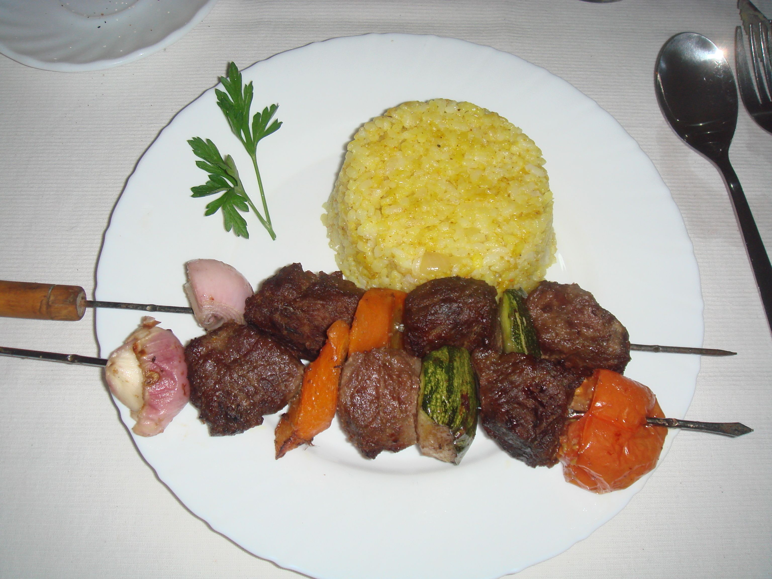 breakfast, lunch served; local and international cuisine, garden views