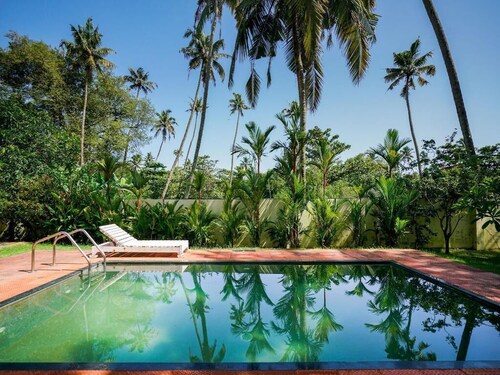 Estancia elegante cerca de la playa Thumpoly, Alappuzha