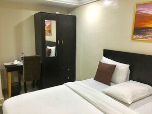 Habitación ejecutiva | Ropa de cama de alta calidad y wifi gratis 