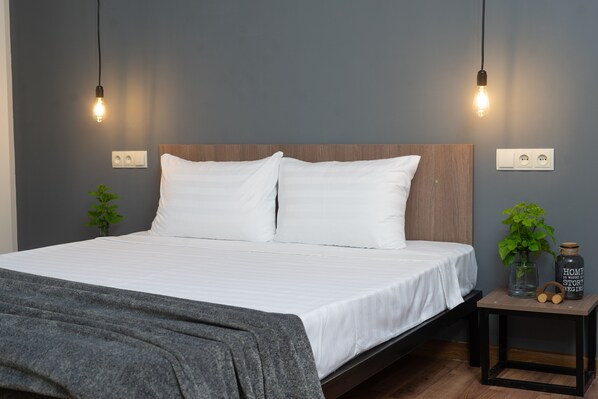 Economy Double Room | Hypo-allergenic bedding, desk, blackout drapes, iron/ironing board