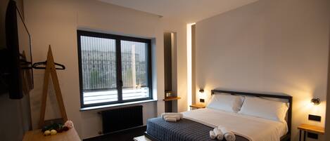 Design Room, 1 Queen Bed, City View (3) | Select Comfort beds, minibar, in-room safe, individually furnished
