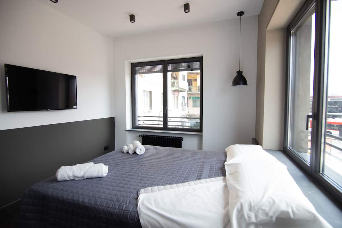Luxury Triple Room, Multiple Beds, City View (1) | Select Comfort beds, minibar, in-room safe, individually furnished