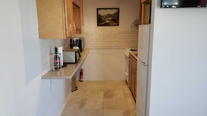 Fridge, microwave, oven, stovetop - Paul's Oceanview Apartment with Amazing Sunsets + Twizy Charger (Sandy's)