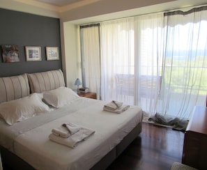 Apartment, 2 Bedrooms | 2 bedrooms, hypo-allergenic bedding, desk, laptop workspace
