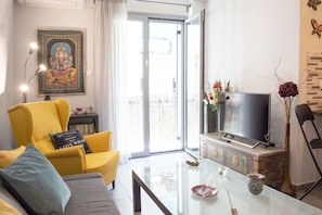 Apartment, 1 Bedroom | Living area | Flat-screen TV