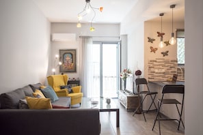 Apartment, 1 Bedroom | Living area | Flat-screen TV