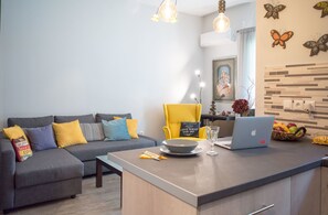 Appartement, 1 slaapkamer | Woonruimte | Een flatscreentelevisie