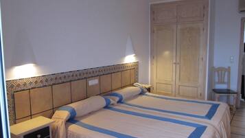 Verduisterende gordijnen, gratis wifi, beddengoed