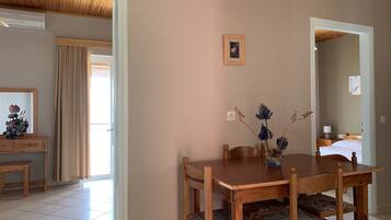 Apartment, 2 Bedrooms, Sea View | Living area | Flat-screen TV