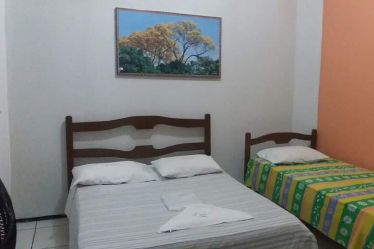 Economy Room | Desk, WiFi (free), bed sheets