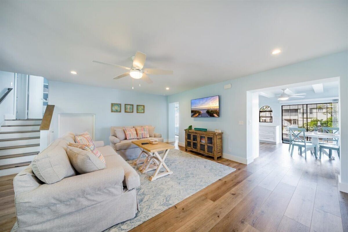 Photo 8 of Adorable canal front cottage close to beach with boat ramp, dock & heated pool.
