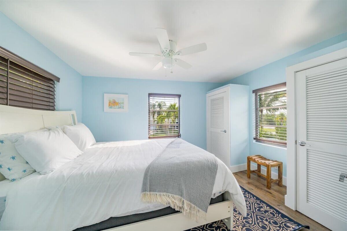 Photo 15 of Adorable canal front cottage close to beach with boat ramp, dock & heated pool.