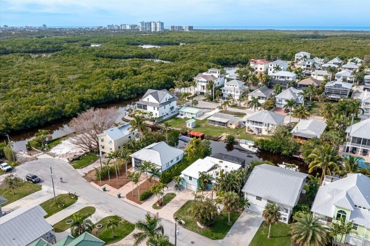 Photo 28 of Adorable canal front cottage close to beach with boat ramp, dock & heated pool.