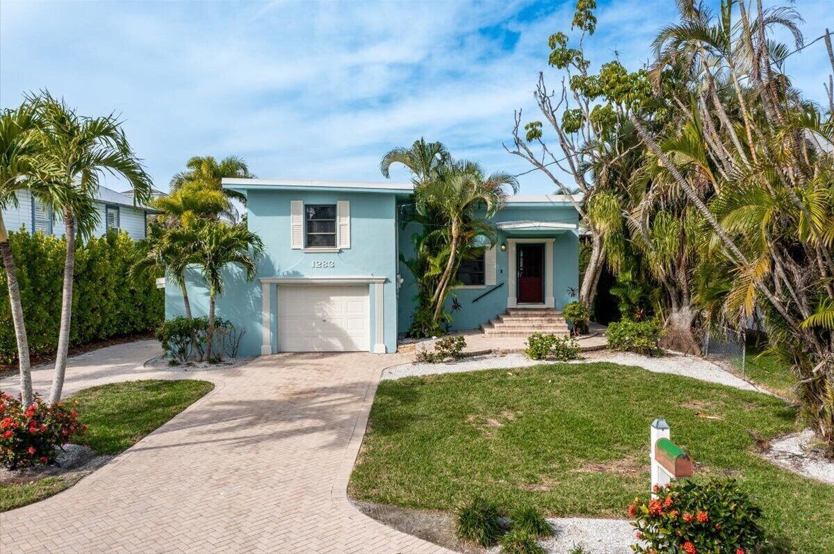 Photo 32 of Adorable canal front cottage close to beach with boat ramp, dock & heated pool.