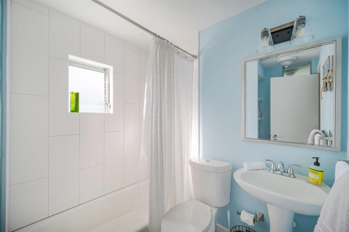 Photo 16 of Adorable canal front cottage close to beach with boat ramp, dock & heated pool.