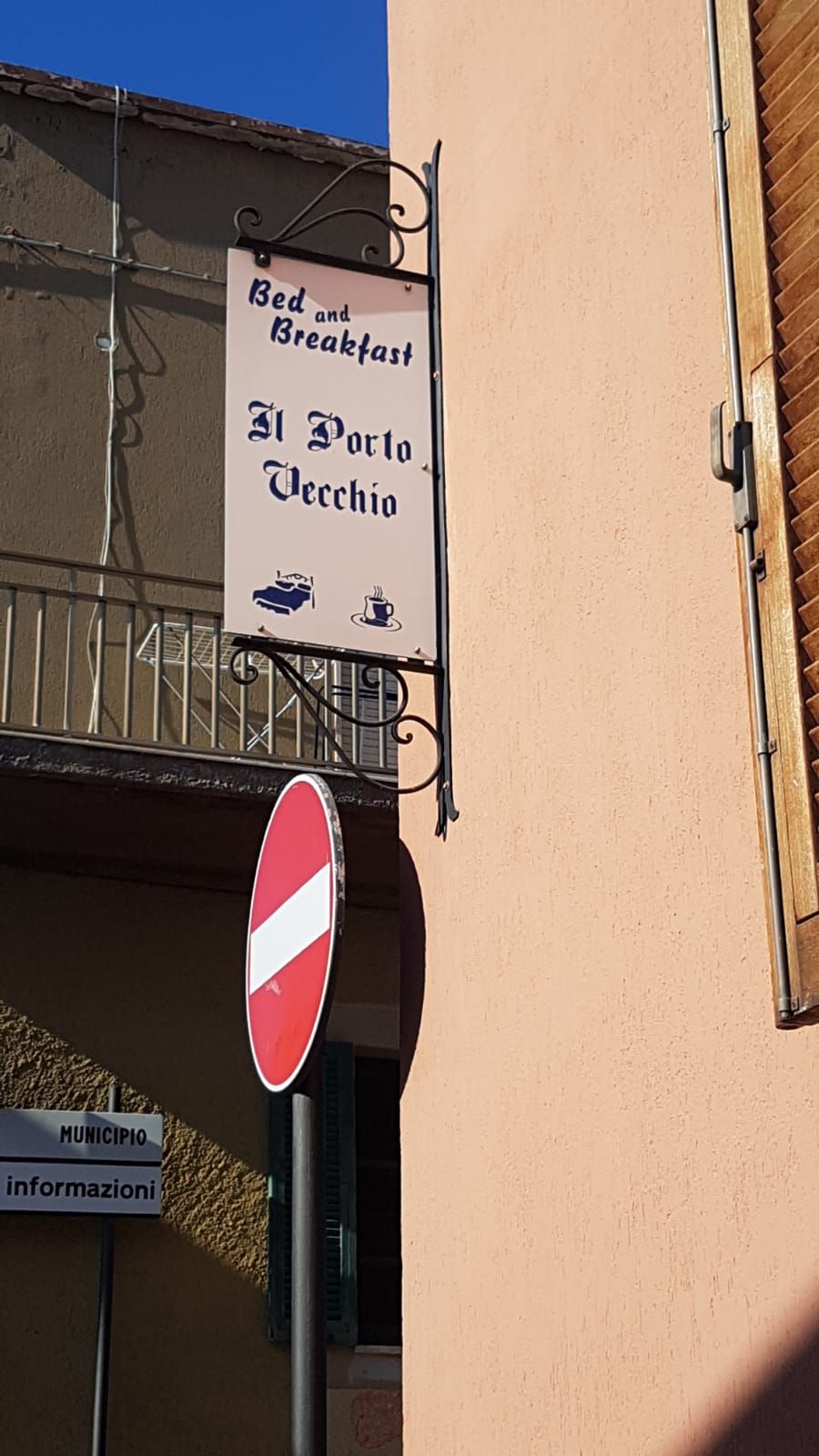 A sign for 'Bed and Breakfast' with a no entry sign below it.