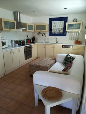 Full-sized fridge, microwave, coffee/tea maker, electric kettle