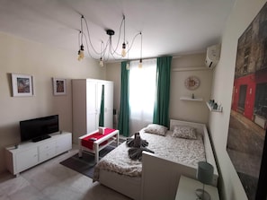 1 chambre, fer et planche à repasser, Wi-Fi, draps fournis