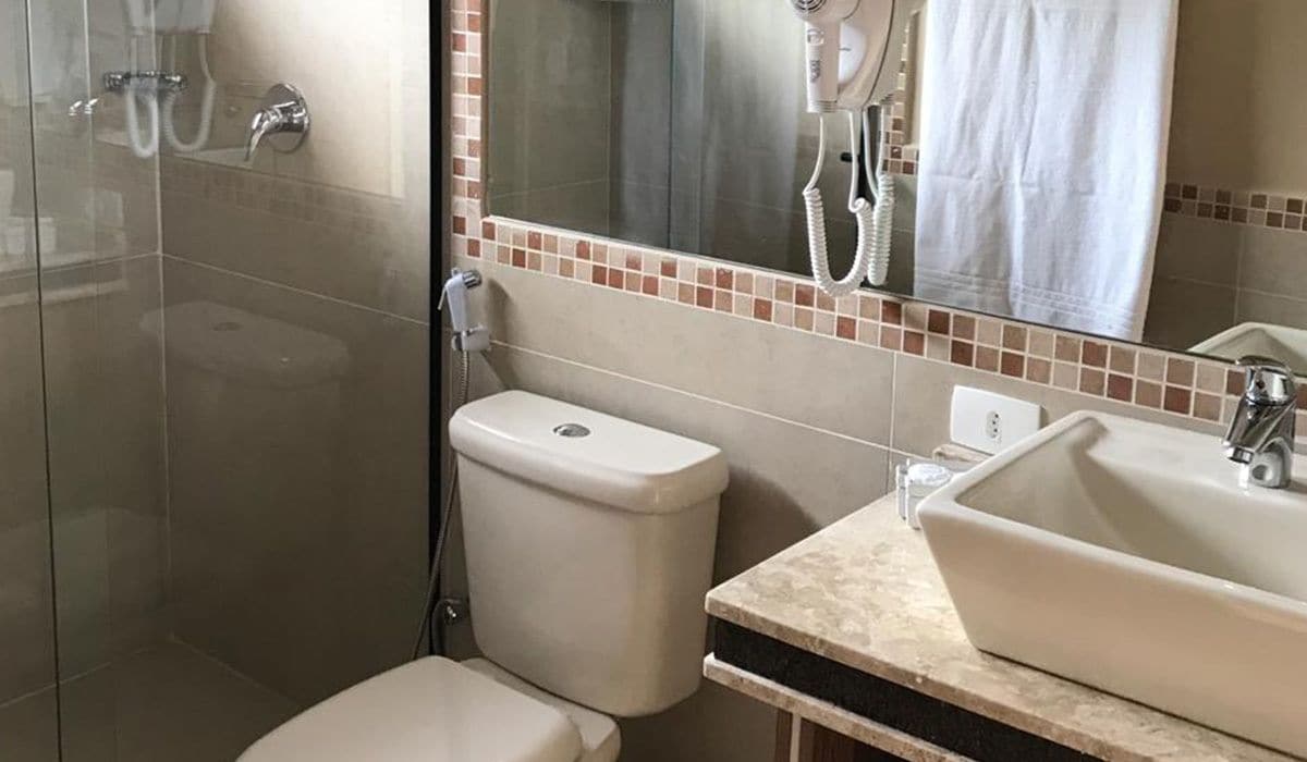 deluxe triple room | bathroom | shower, free toiletries, hair dryer, towels