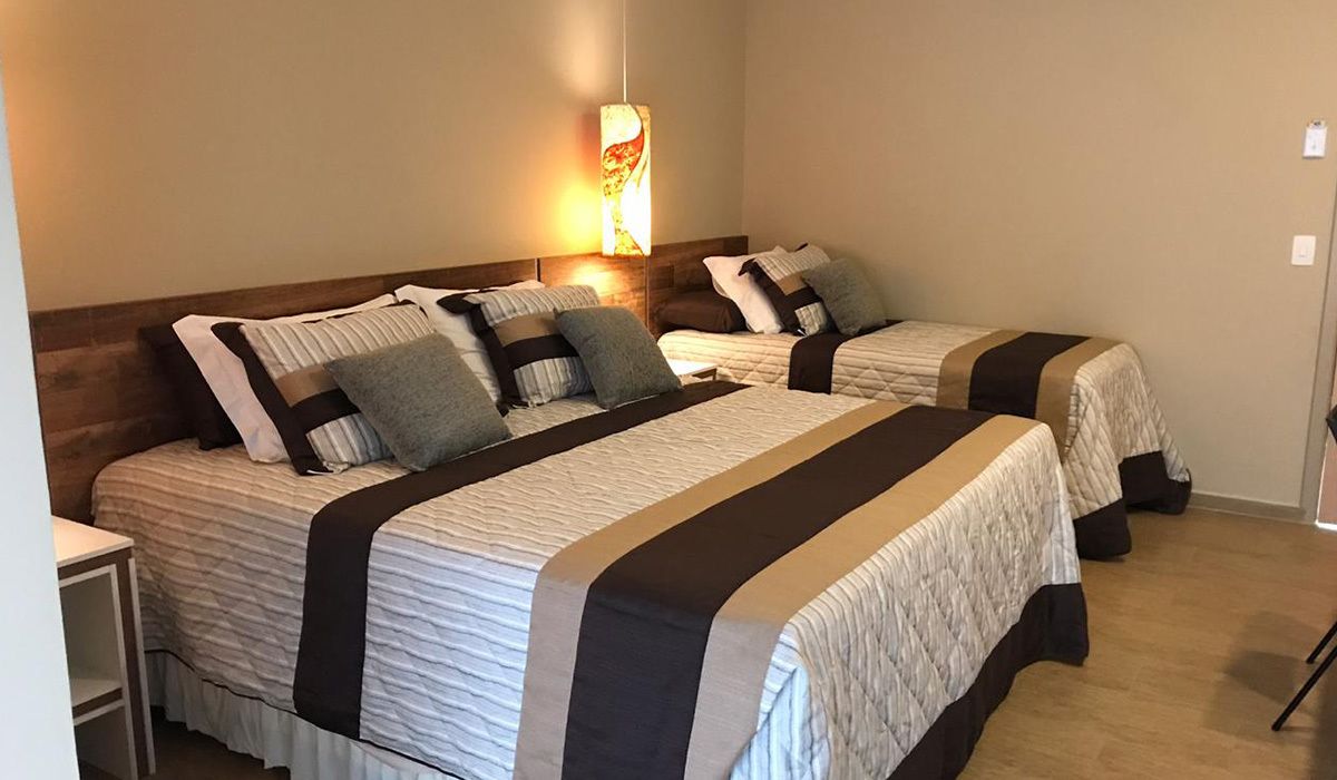 deluxe triple room | blackout curtains, iron/ironing board, free wifi, bed sheets