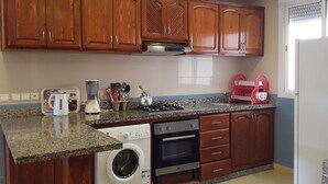 Apartment | Private kitchen | Coffee/tea maker, full-sized fridge, oven, stovetop - Résidence Mers Beach Appart Vue Piscine (Moulay Abdallah)