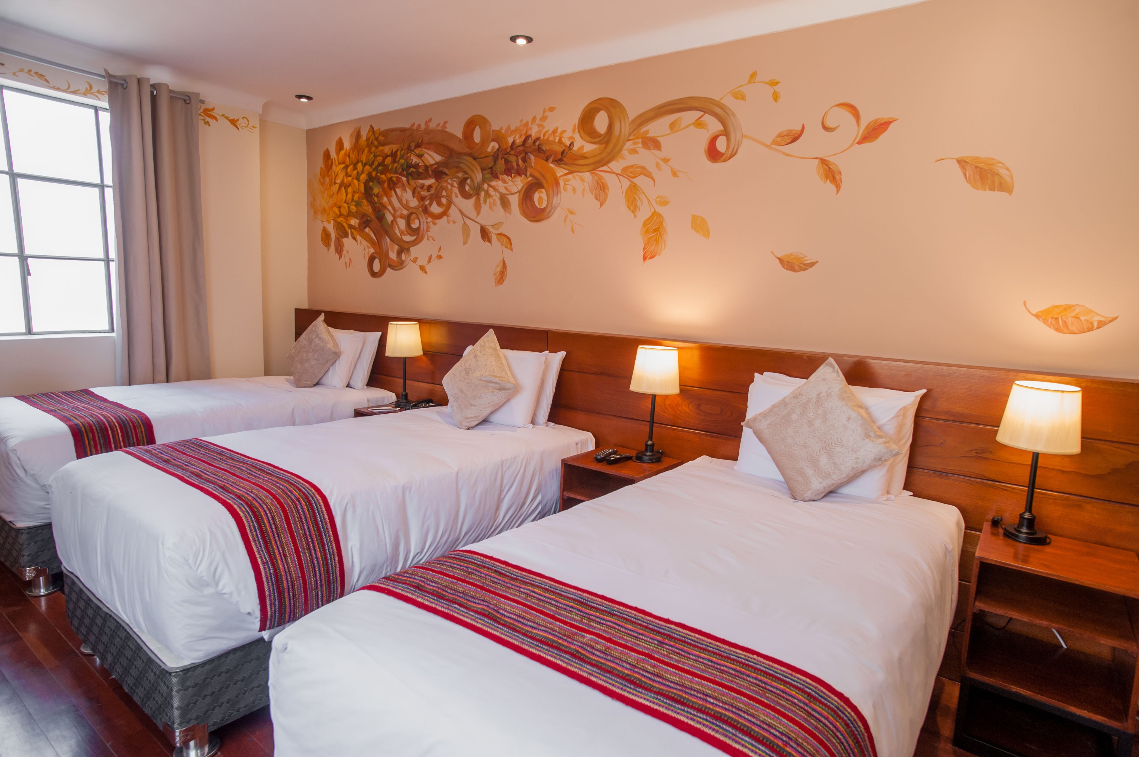 deluxe triple room | 1 bedroom, minibar, in-room safe, individually decorated