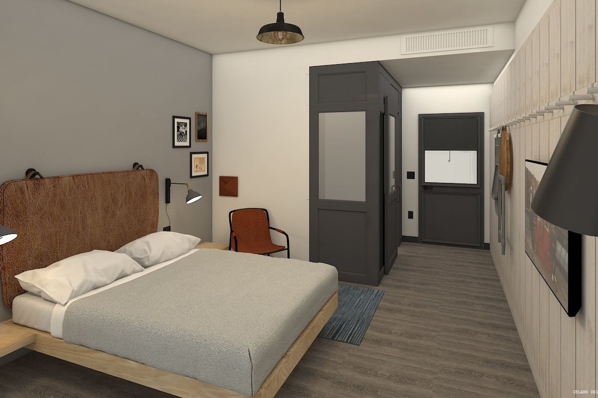 Habitación individual Confort | Cortinas blackout, insonorización y tabla de planchar con plancha