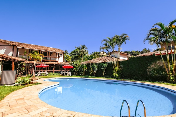 Outdoor pool, open 9:00 AM to 11:00 PM, pool umbrellas, pool loungers