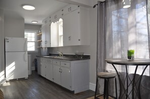 Signature Apartment, Garden View | Private kitchen | Full-size fridge, microwave, oven, stovetop