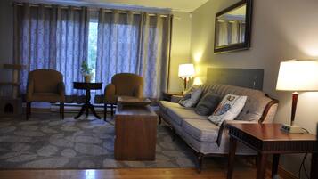 Superior Apartment, Multiple Beds | Living area | Flat-screen TV