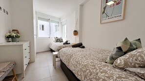2 dormitorios, tabla de planchar con plancha, wifi gratis y ropa de cama