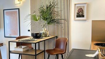 Superior Studio Suite, 1 King Bed, Sea View | Living area | LCD TV