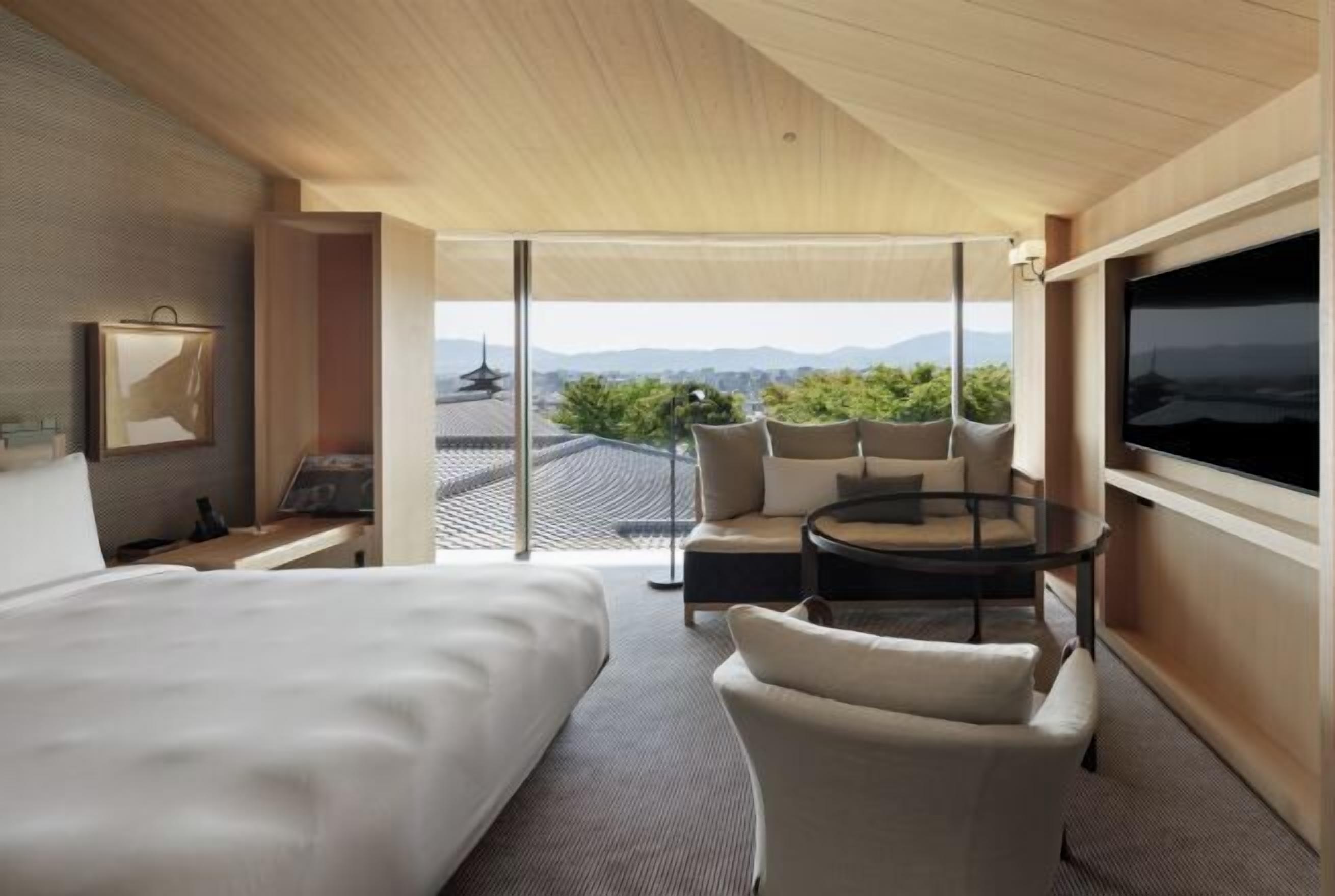 Roupas de cama premium, edredons de pluma, frigobar, cofres nos quartos