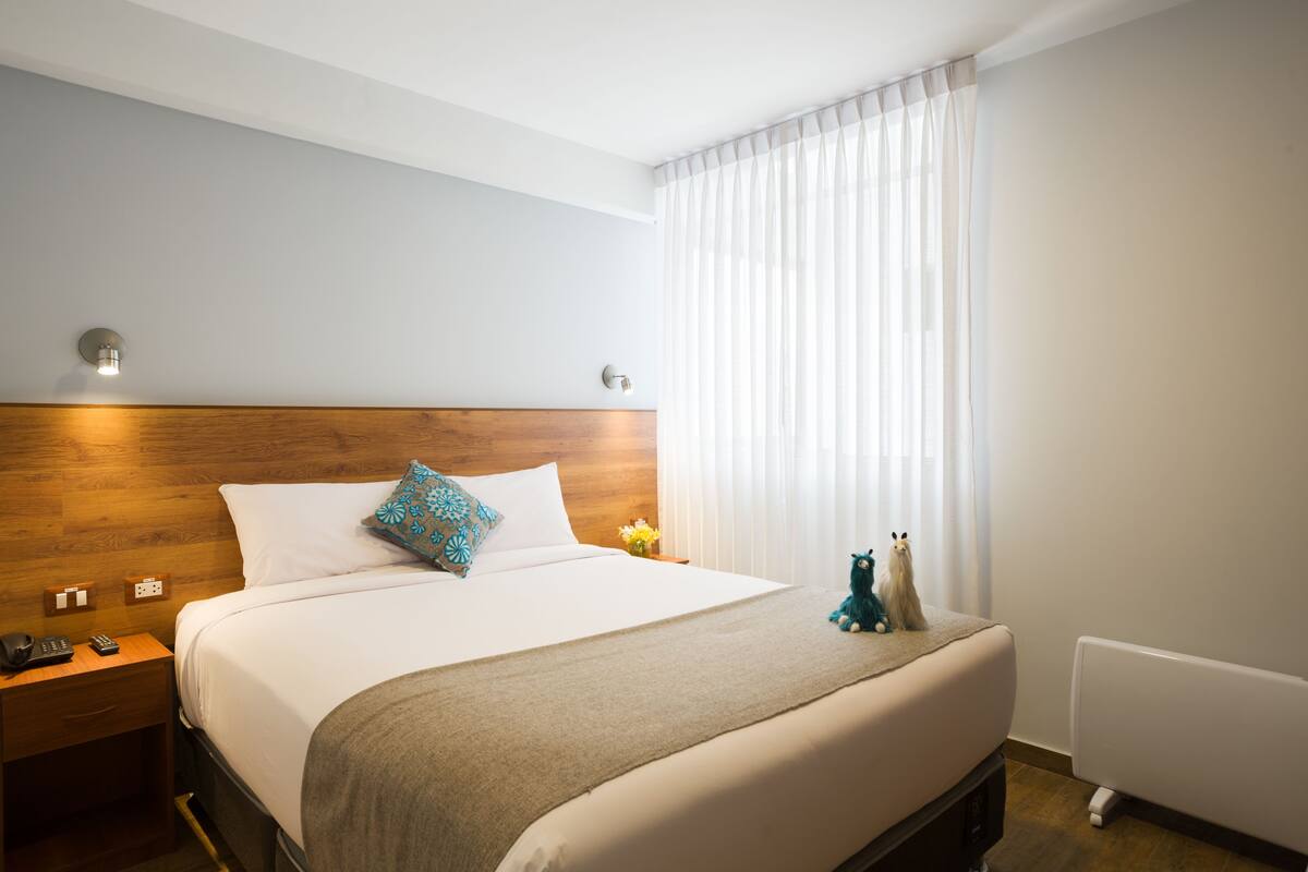 1 habitación y ropa de cama de alta calidad