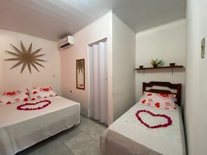 Quarto triplo | Frigobar, cortinas blackout, Wi-Fi de cortesia, roupa de cama